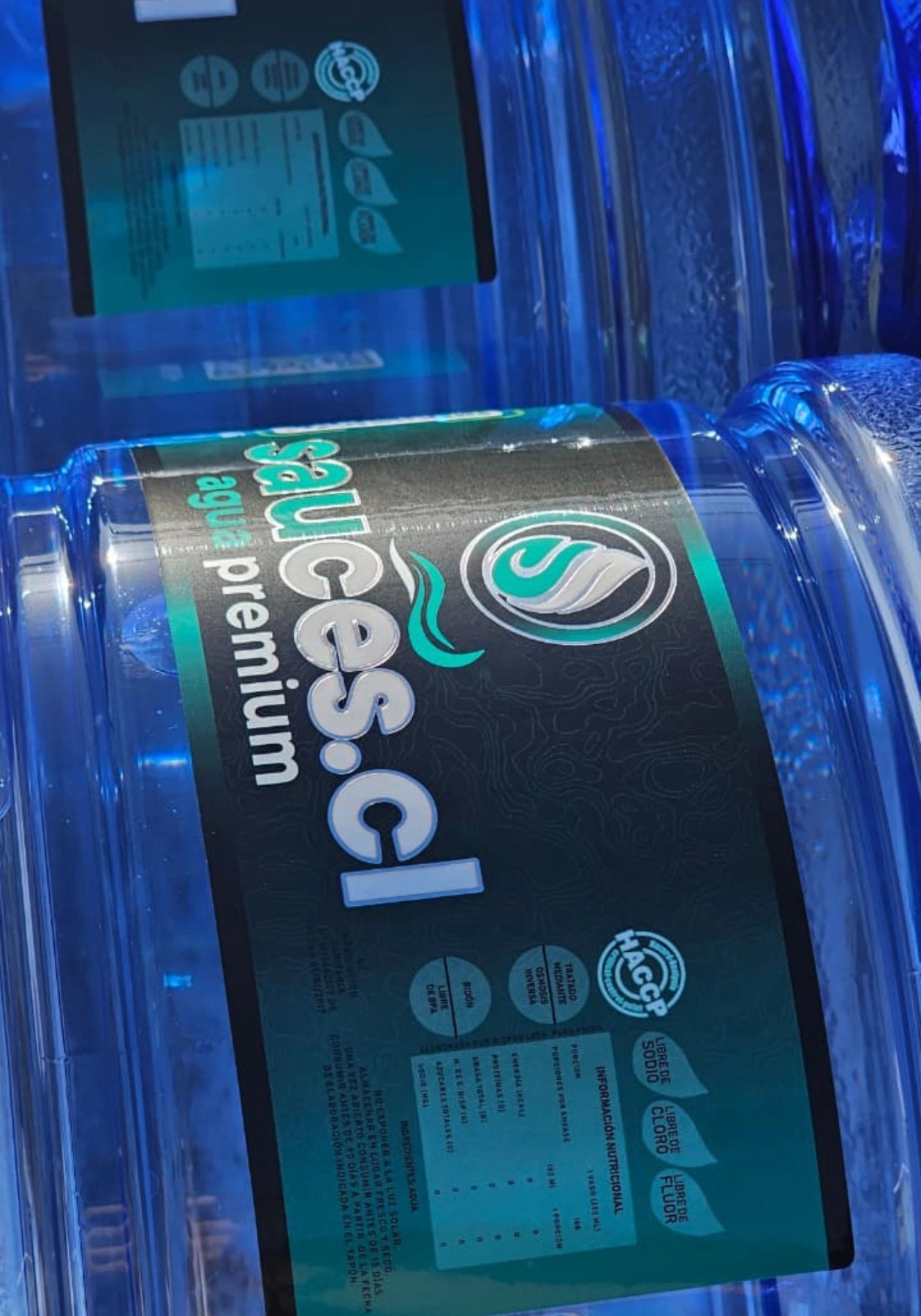 Detalle de la etiqueta Sauces.cl agua premium en bidón de 20 litros